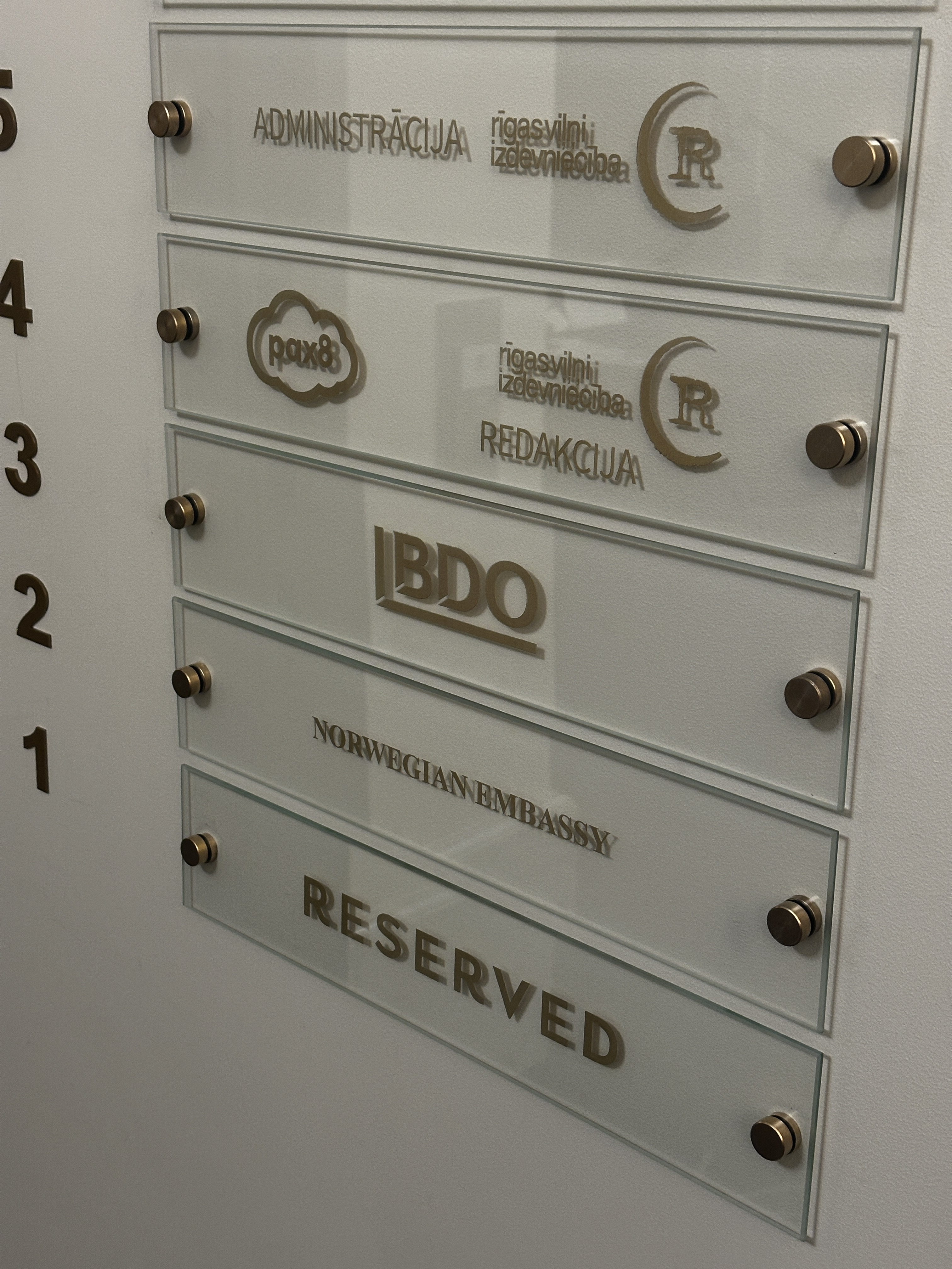 Etched glass directory signage for an office building