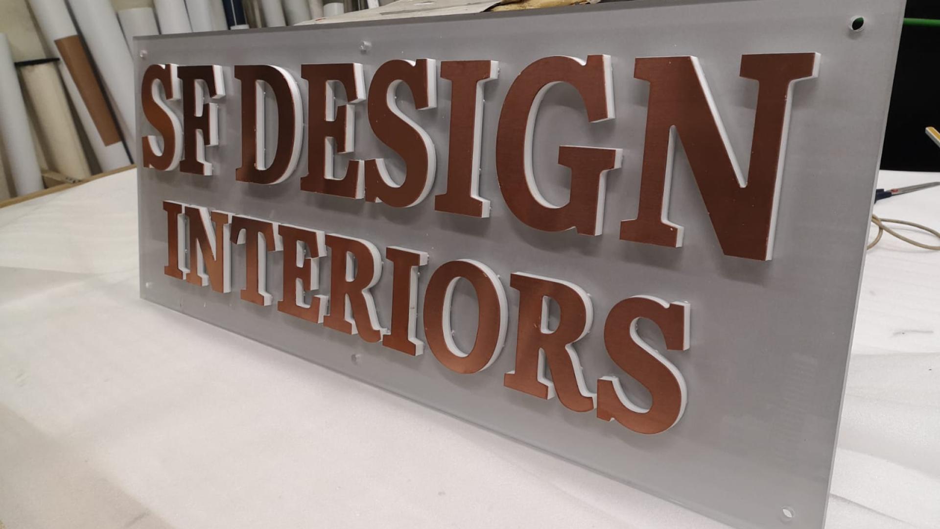 Dimensional letter signage for interior design and beauty brands